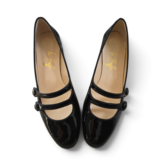 Frida tonda in vernice nera