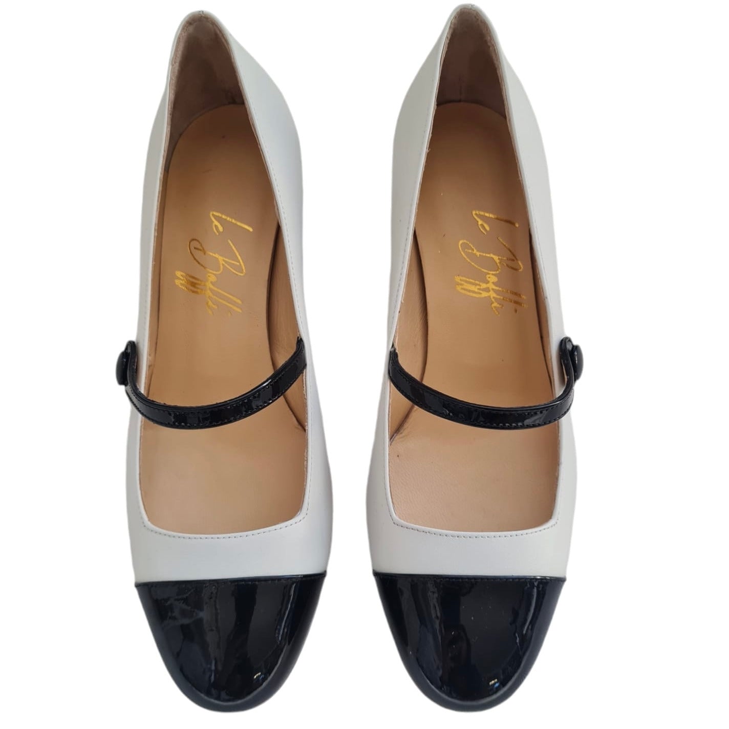 Emma 55 tonda in pelle bianca e vernice nera