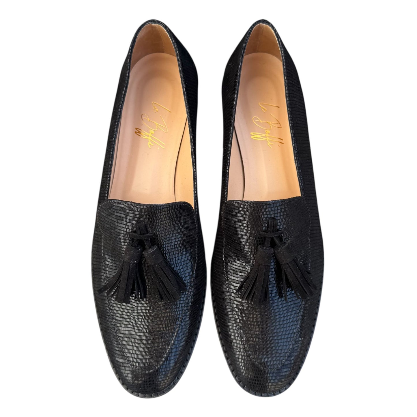 Olimpia in rettile nero