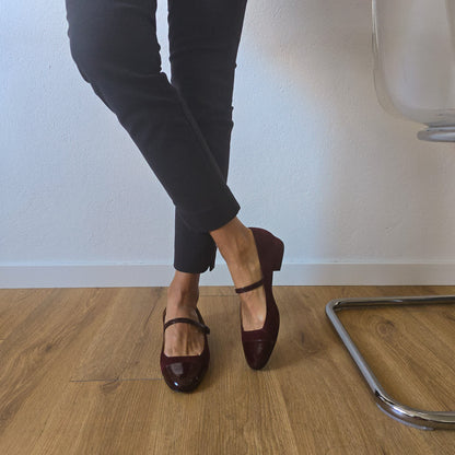 EMMA TONDA in camoscia terracotta e vernice bordeaux