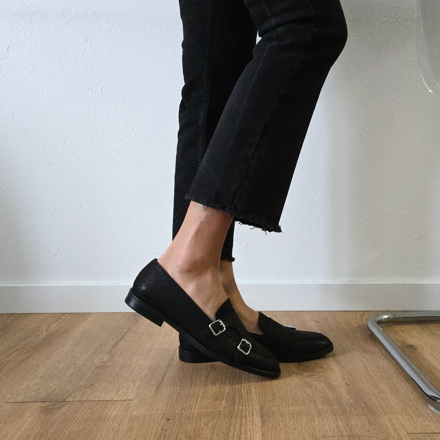 PRISCILLA in rettile nero