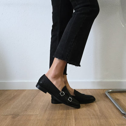 PRISCILLA in rettile nero