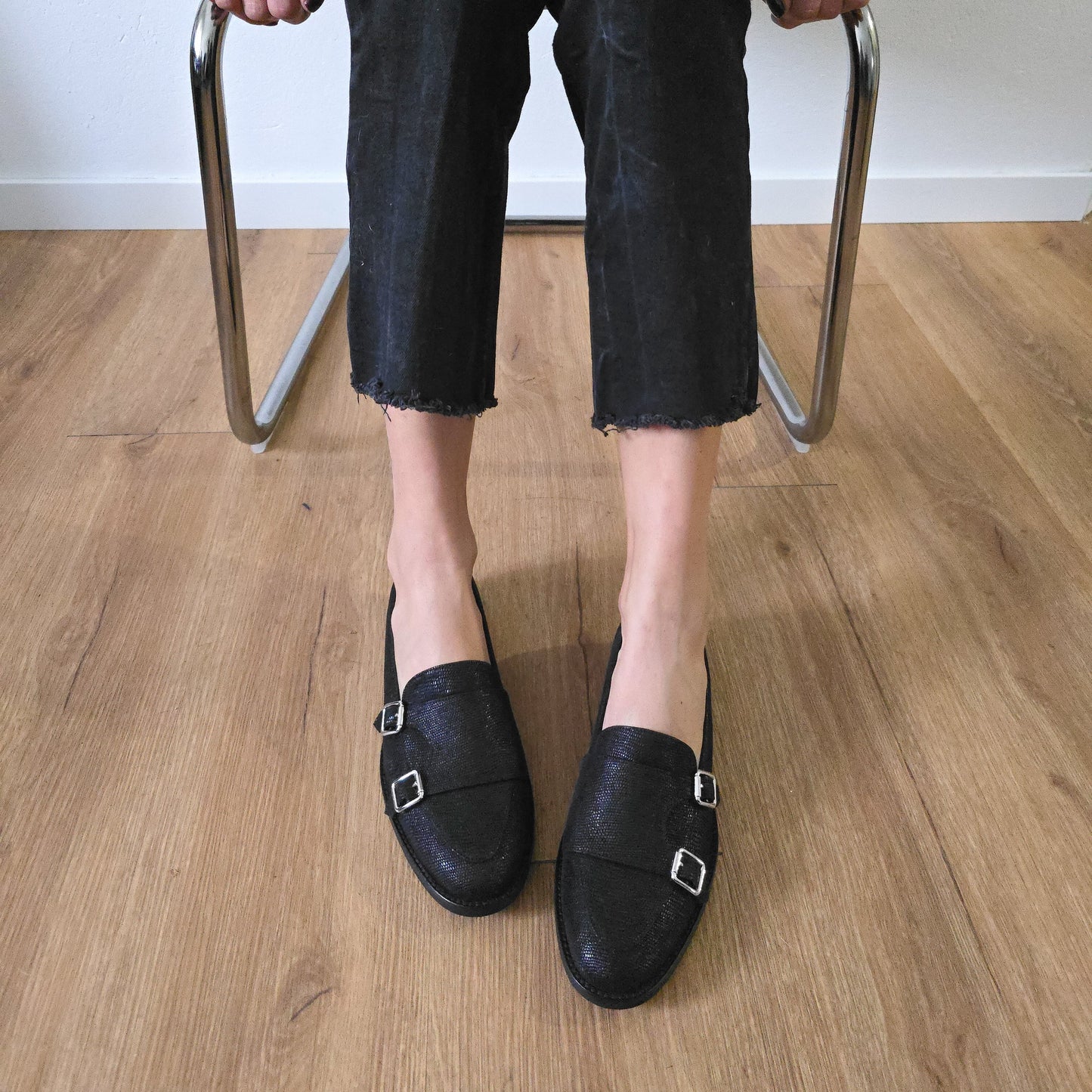 PRISCILLA in rettile nero