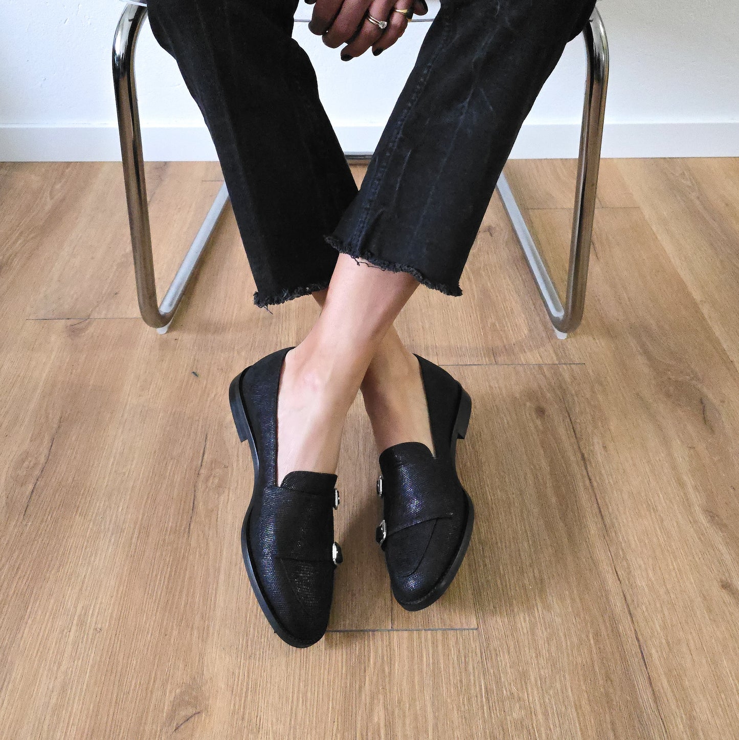 PRISCILLA in rettile nero