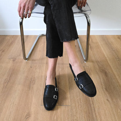 PRISCILLA in rettile nero