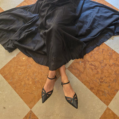 Celeste in pelle lavorata nera