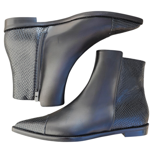 Sibilla in pelle nera e Rettile nero