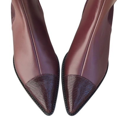 Sibilla in pelle prugna e Rettile prugna